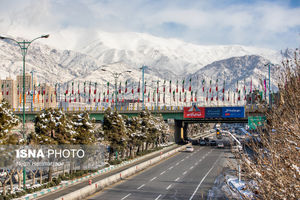 Daily Life in Tehran: Snow-Covered City
